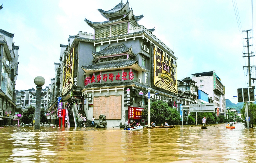 The mainland's flood response alert was raised to the second-highest level yesterday