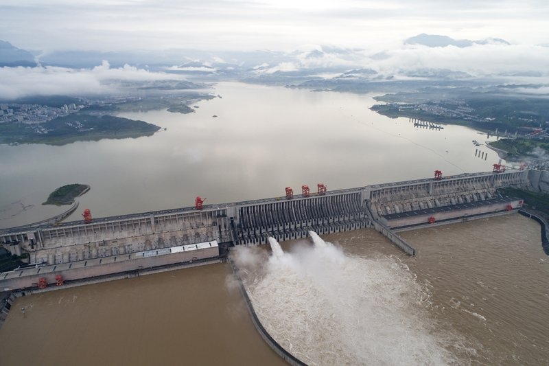Authorities in central China blasted a dam on Sunday to release surging waters behind it amid widespread flooding across the country 