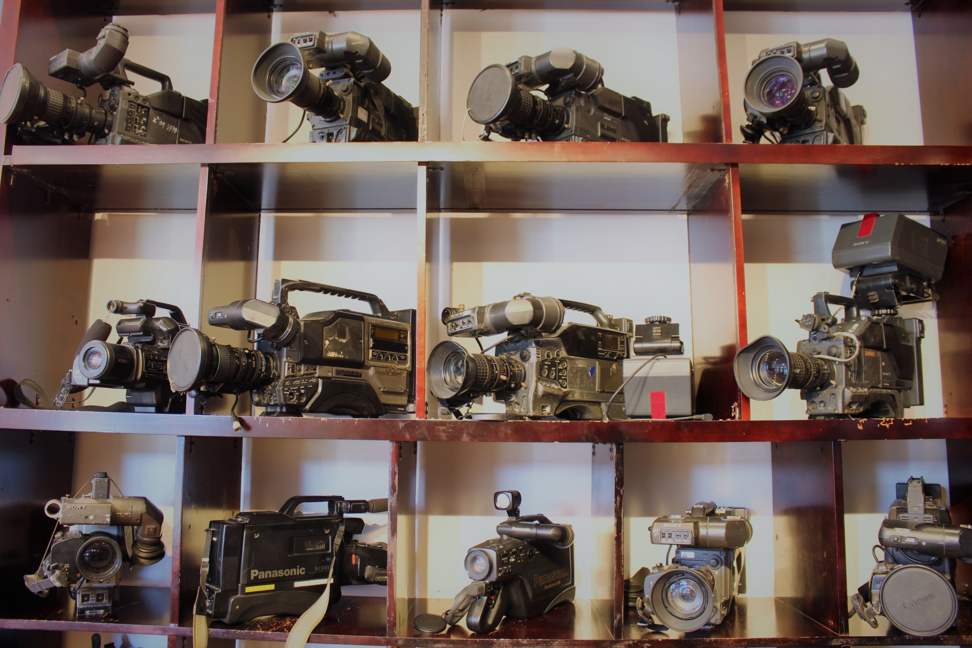 A  bunch of old cameras used in the 1990s on display at sen's showroom