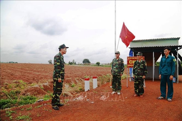 Border guards in Tay Ninh Province on duty for COVID-19 prevention and control. 