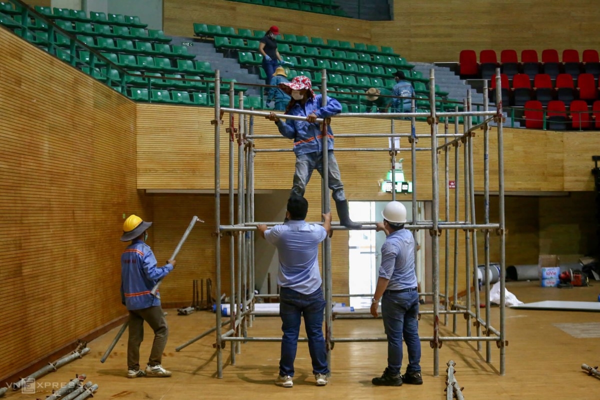 Around 50 workers set up scaffoldings to build electrical systems for the hospital.