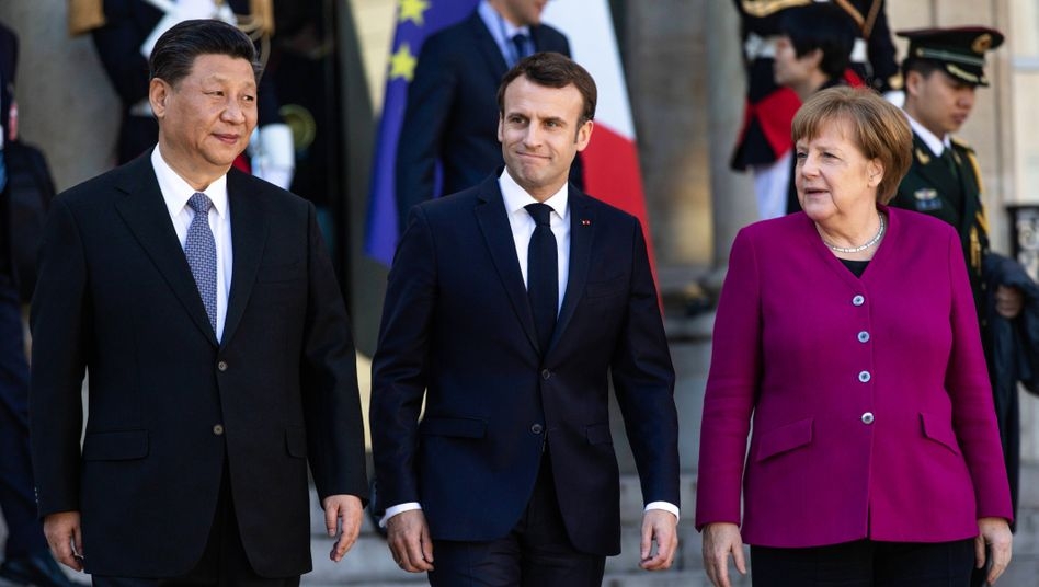 Presidents Xi and Macron together with Chancellor Merkel in Paris in 2019