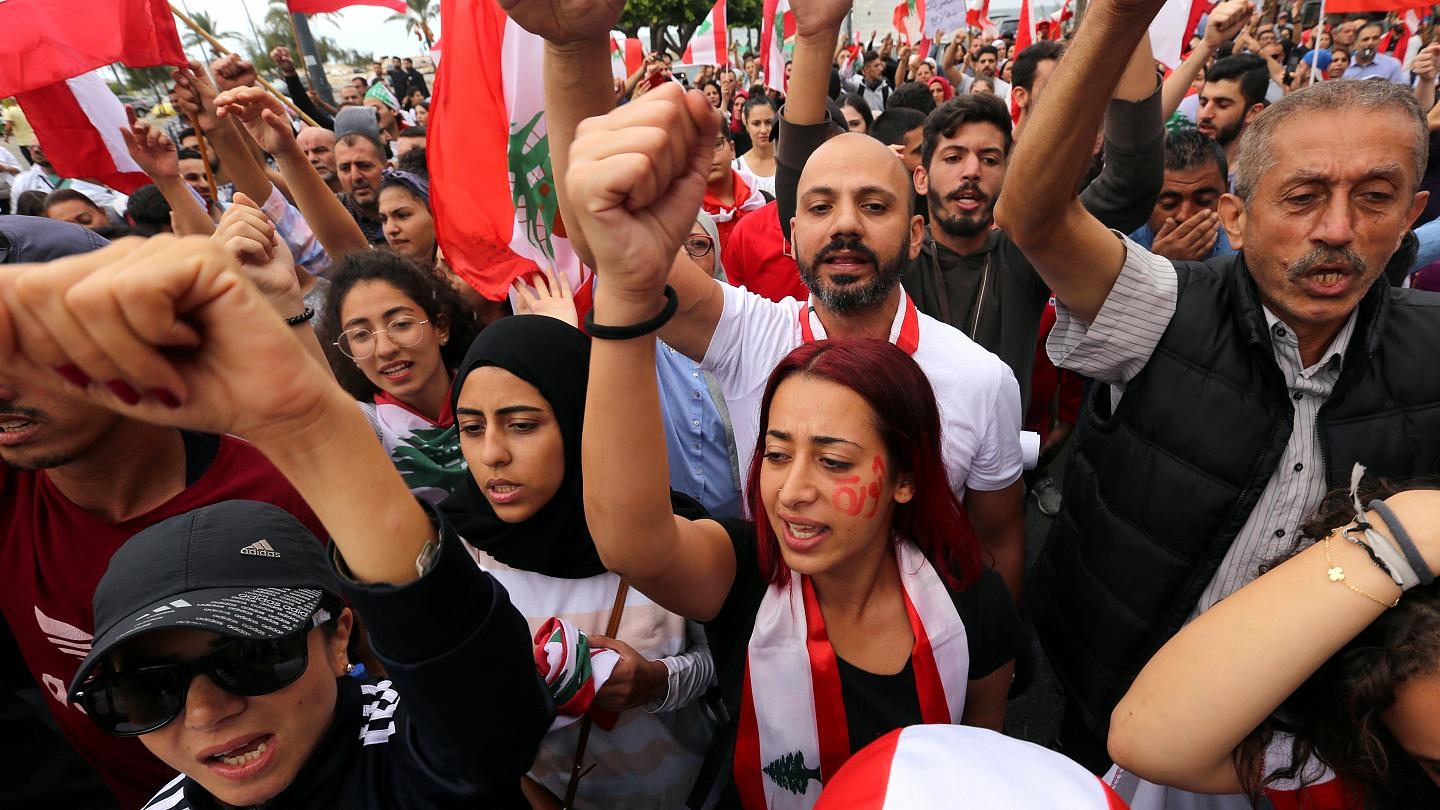 thousands of protesters threw stones at the Lebanese parliament building, demanding the dissolution of the government after the Beirut port explosion.