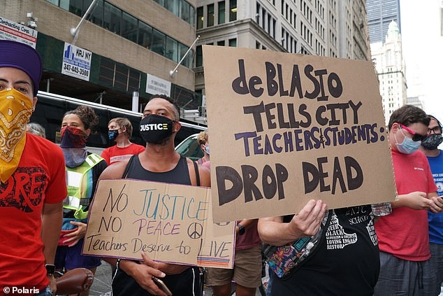 New York City teachers on Wednesday threatened to strike or take legal action unless the largest US school district implements a more rigorous COVID-19 testing plan of reopening next month