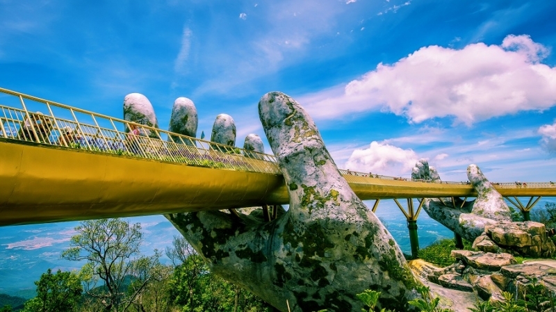 british newspaper speaks highly of vietnams golden bridge and ha long bay