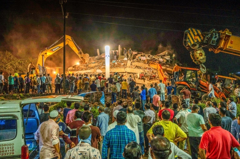 At least 90 people are feared trapped in the debris of a five-storey building that collapsed to the south of India’s financial capital of Mumbai