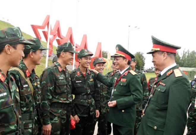 The team are praised and congratulated on by Lieutenant-General Ngo Tien Minh