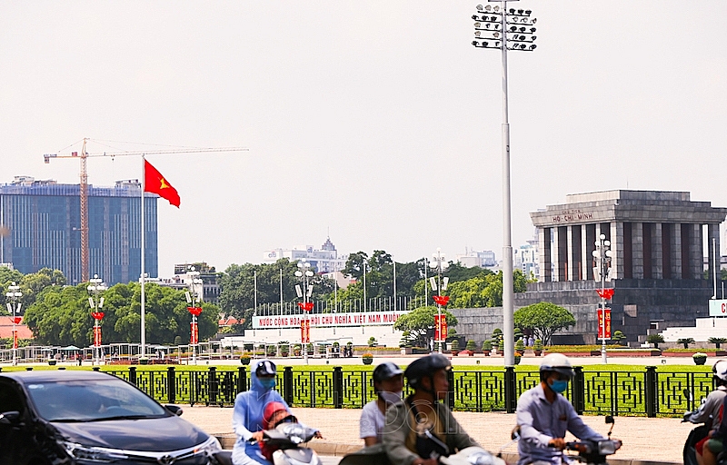 The streets in Hanoi is filled with flags and banners