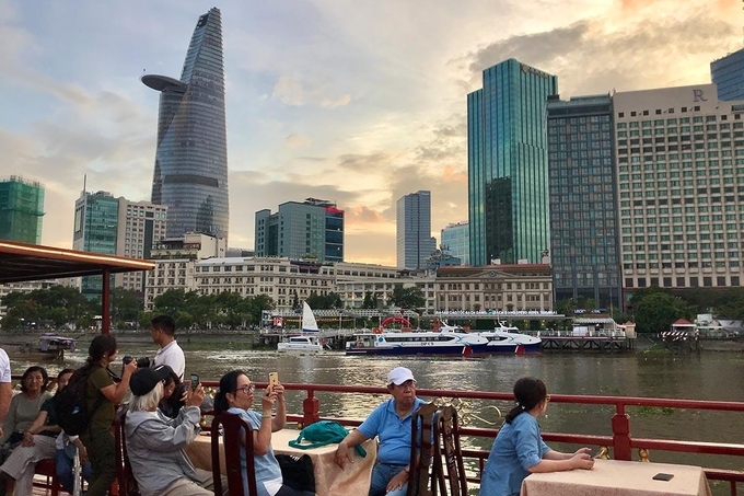 Visitors on cruise ship on Saigon River 