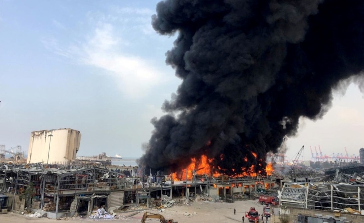 A large fire erupted at Beirut port on Thursday, engulfing parts of the Lebanese capital in a pall of smoke