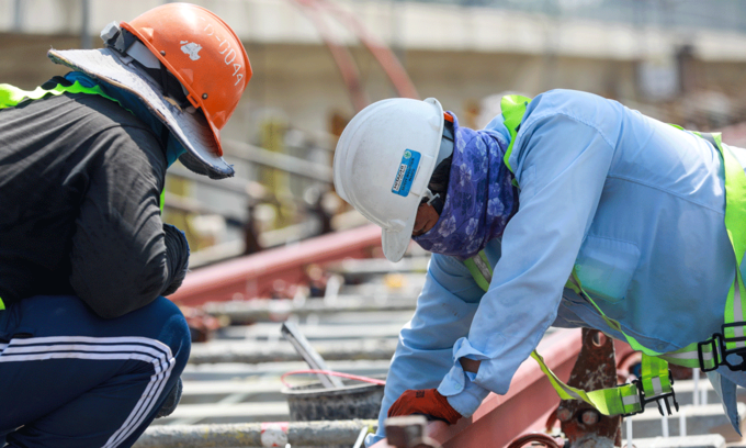 Workers build Ben Thanh - Suoi Tien, the first metro line in Ho Chi Minh City in April 2020