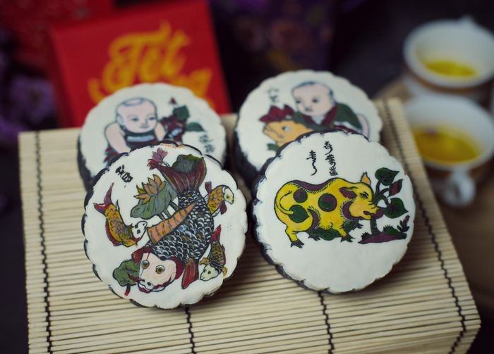 2 traditions in 1 baker creates folksy dong ho paintings on delicious mooncakes