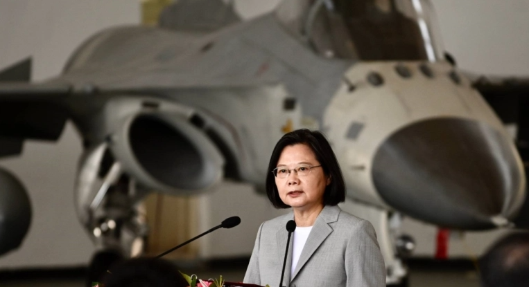 Taiwan’s President Tsai Ing-wen speaks in front of a domestically-produced F-CK-1 Indigenous defence fighter jet during a visit to Penghu Air Force Base on Magong island last month (Photo: AFP) 