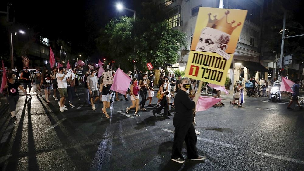 Locals take to the street to call for PM's resignation (Photo: EuroNews) 