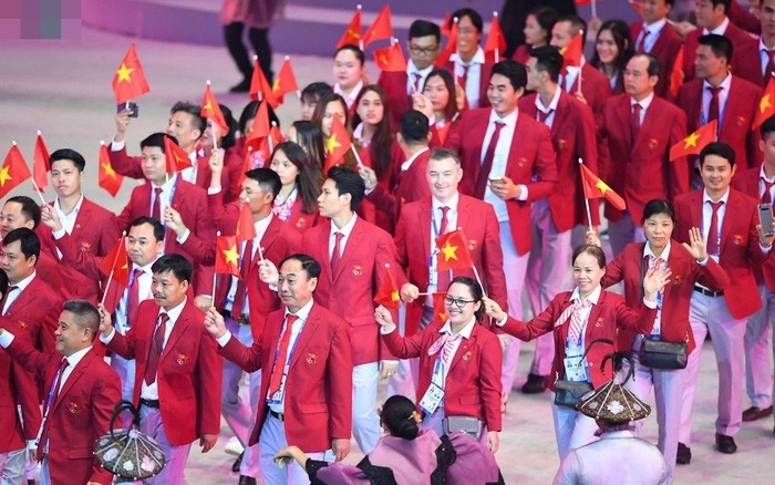 The Vietnamese sports delegation march during the opening ceremony of the 30th SEA Games in the Philippines last year. (Photo: VOV)