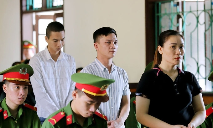 This picture taken on Sept 14, 2020 and released by the Vietnam News Agency shows defendants at a trial against those involved in organising for people to migrate abroad, in connection with the deaths of 39 migrants found in a refrigerated truck in Britain last year, at a court in Ha Tinh province. (Photo: AFP)