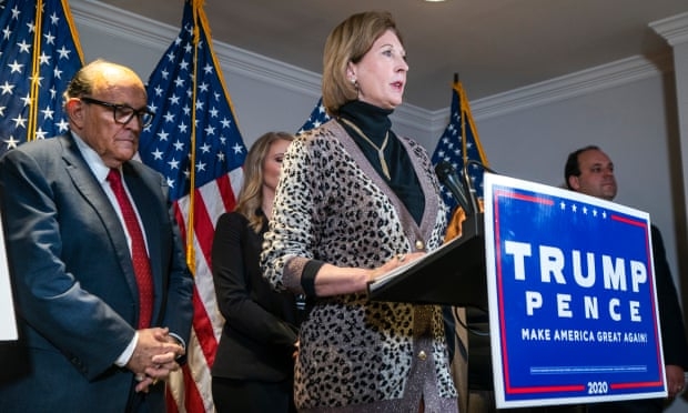 Attorney Sidney Powell (C), speaks alongside Trump lawyer and former mayor of New York City Rudy Giuliani at the Republican National Committee headquarters in Washington, DC.  (Photo: EPA) 