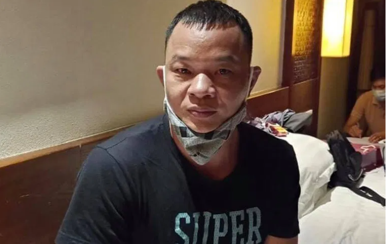 Gao Liang Gu, the Chinese national arrested for illegally bringing foreigners to Vietnam ( Photo courtesy of Public Security Newspaper) 