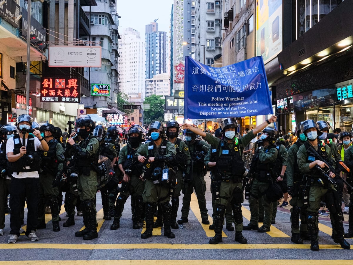 China will be charging 12 people from Hong Kong who were caught trying to flee the city in a speedboat (Photo: Guardian) 