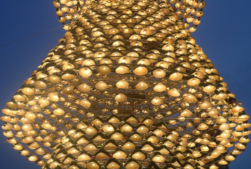 Each conical hat is tagged with a small light bulb and one bauble (Photo: PLO) 