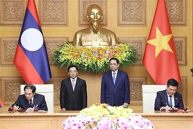 Photo: Laos Prime Minister Begins Visit in Vietnam