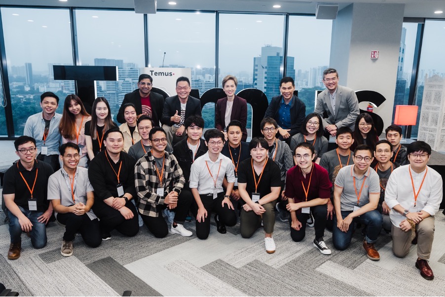 (Back row) Minister for Communications and Information Josephine Teo (centre), with (from left to right) Temus Founding Member and Chief Revenue Officer Srijay Ghosh, Temus CEO KC Yeoh, Permanent Secretary, Ministry of Communications and Information, and Cybersecurity, Smart Nation and Digital Government Joseph Leong and IMDA CEO Lew Chuen Hong with the first cohort of Step IT Up trainees