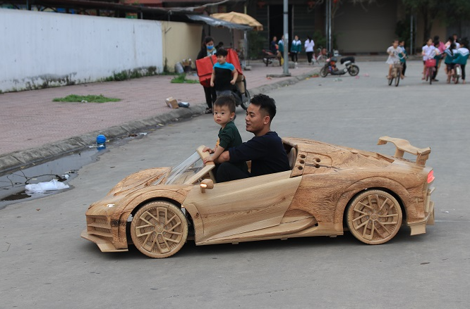 vietnamese father built wooden bugatti centodieci for his son