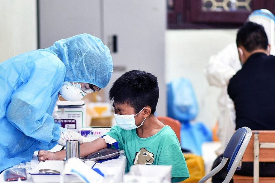 Vietnam Covid-19 Updates (March 24): 24-hour Tally Hits Over 127,800 New Cases