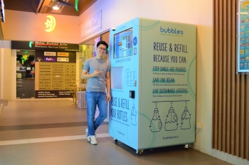 Crushing Single-Use Plastic With Bubbles Refillery Vending Machines