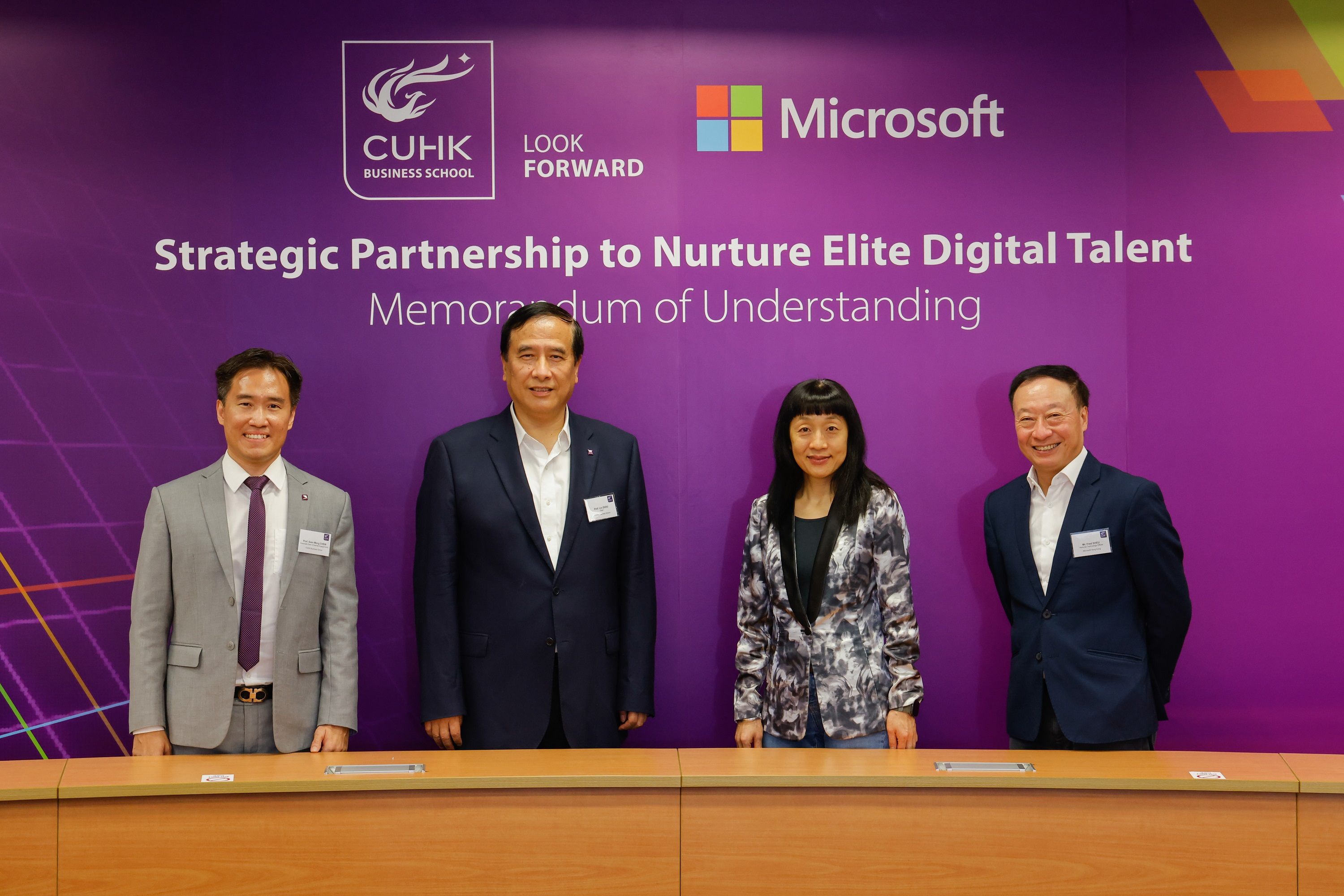 (From Left to Right) Prof. Seen-Meng Chew, Associate Dean (External Engagement) of CUHK Business School, Prof. Lin Zhou, Dean of CUHK Business School, Cally Chan, General Manager of Microsoft Hong Kong and Macau and Mr. Fred Sheu, National Technology Officer, Microsoft Hong Kong, announced the 