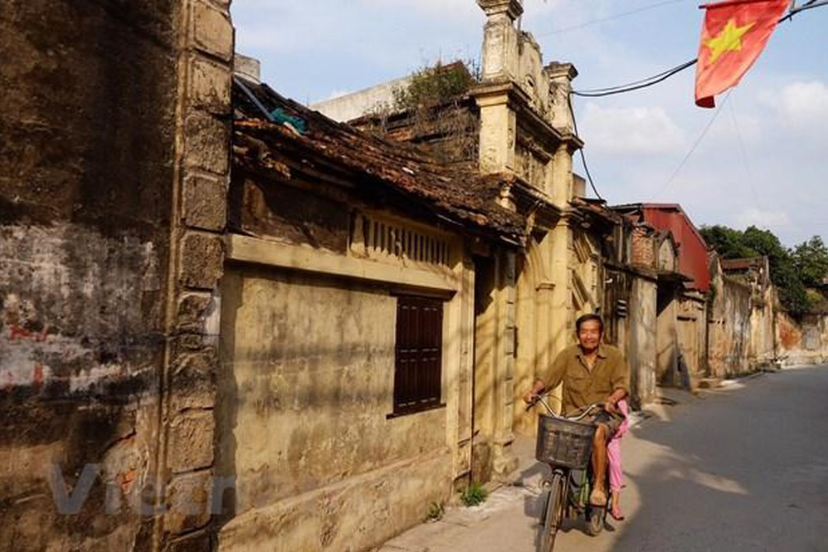 Exploring antique beauty of 5th-century village in Hanoi's suburb exploring antique beauty of 5th century village in hanois suburb