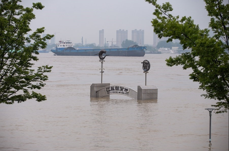 china flood updates thousands trapped after levees fail dams at risk of breaking