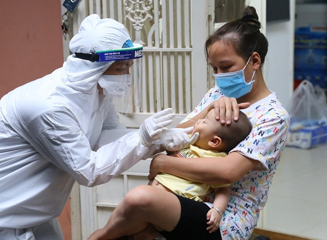 Covid News Briefing (July 18): Daily Infection Reaches Record, Hanoi Tightens Restrictions