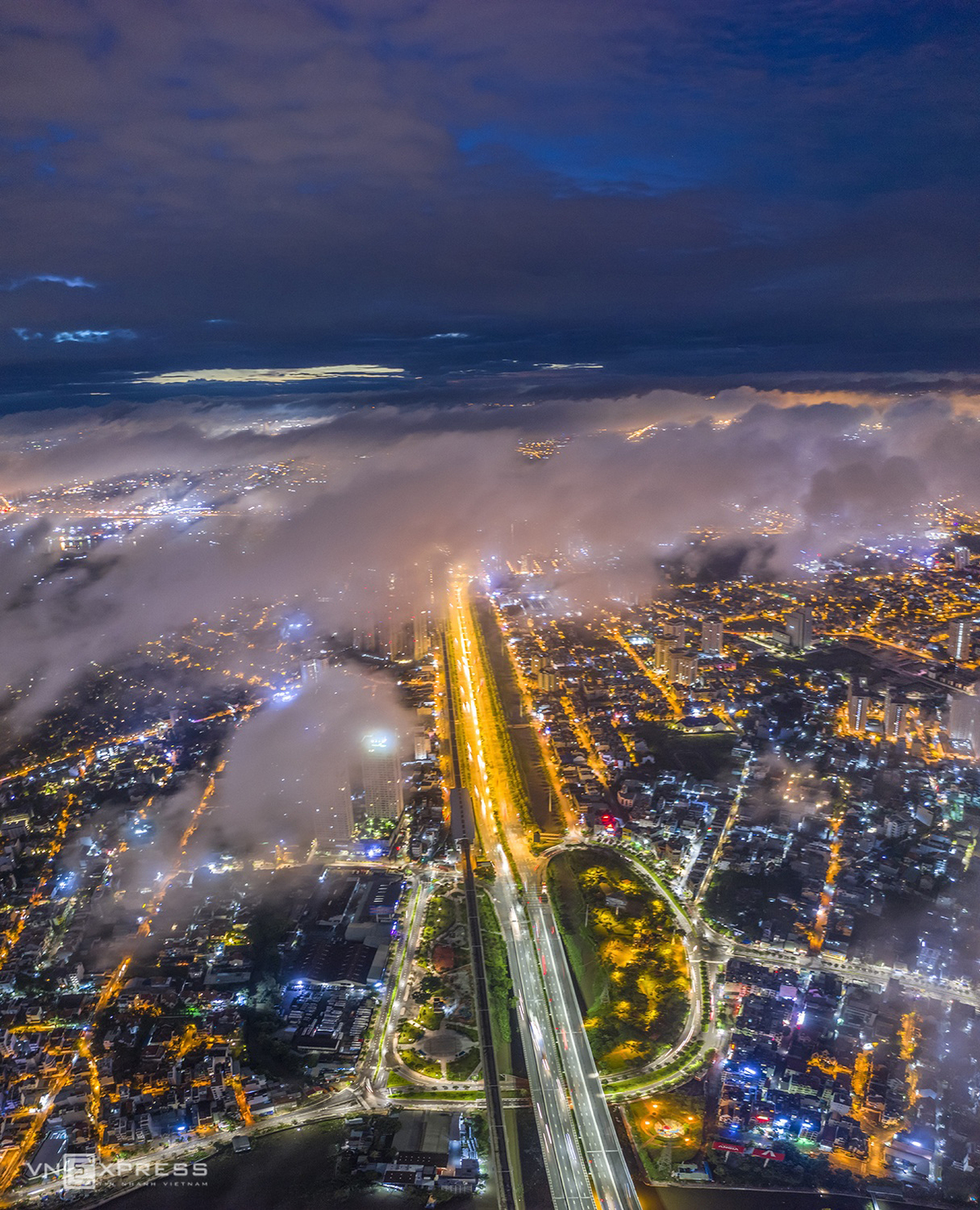 a dreamy saigon under cloud and fog