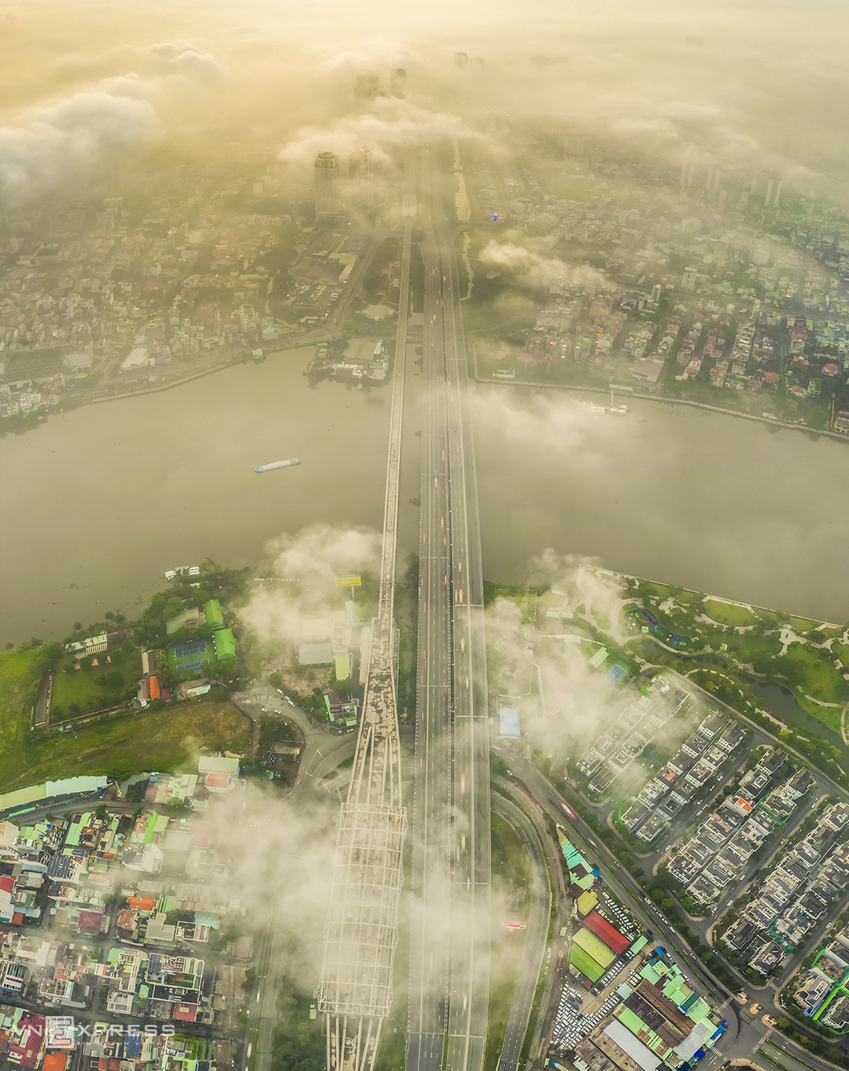 a dreamy saigon under cloud and fog