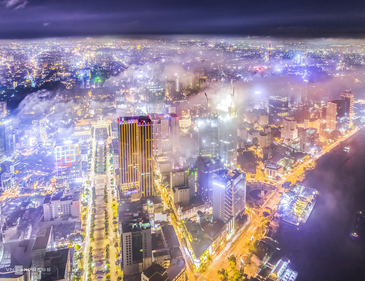 a dreamy saigon under cloud and fog