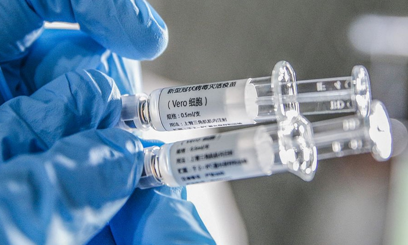 updates on world covid vaccines china approves sinopharm uk authorizes astrazeneca
