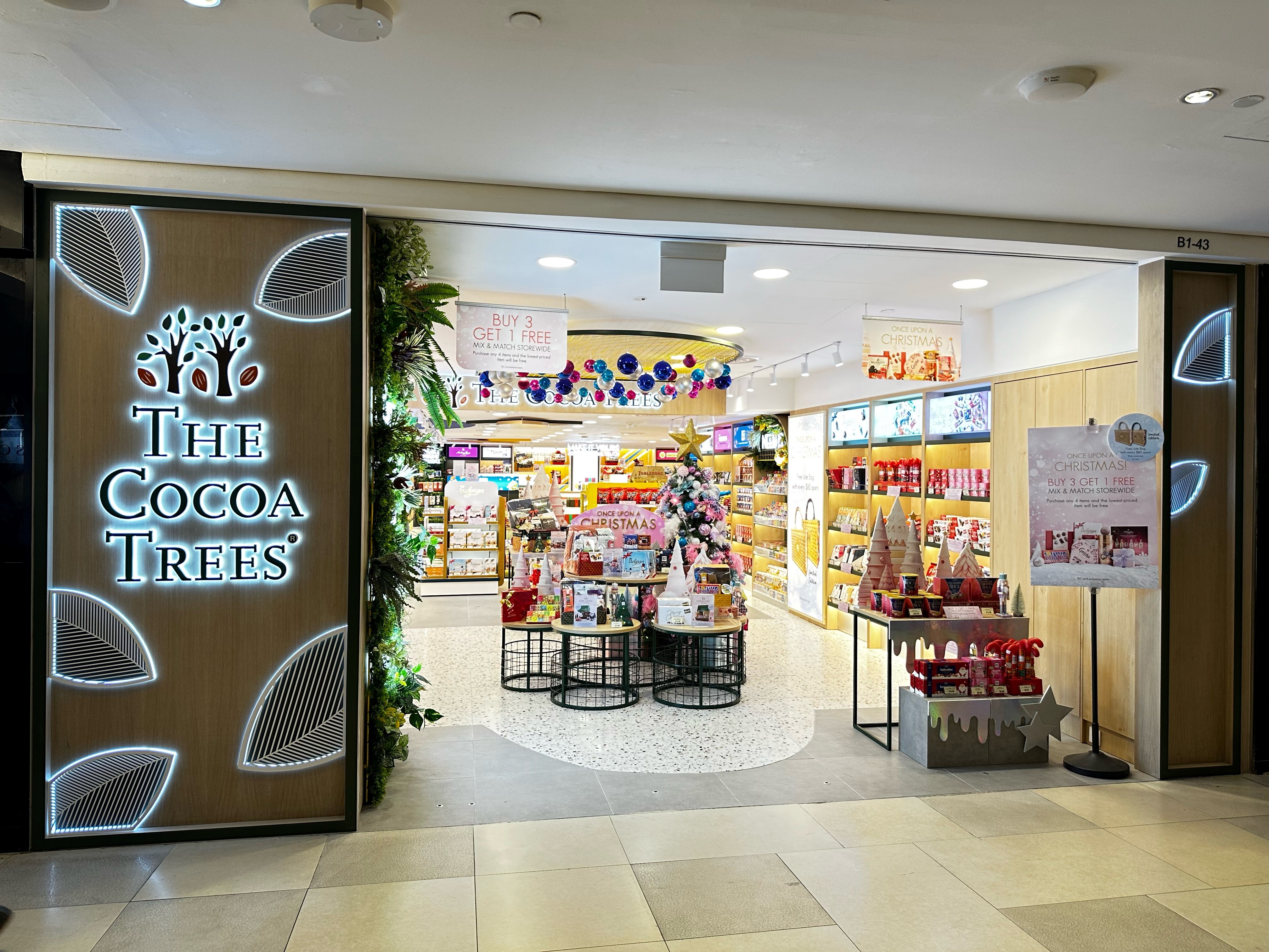 sweet xmas spectacle sparkles inside the cocoa trees revamped flagship store in raffles city singapore