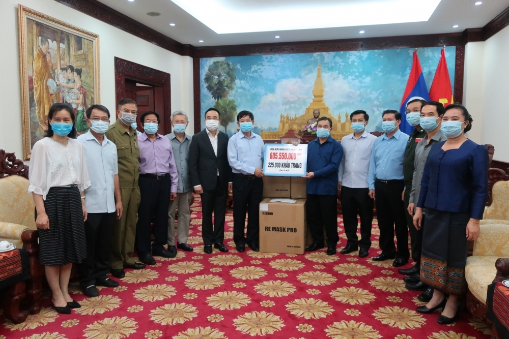 vietnam laos friendship association offers more support to help laos fight covid 19