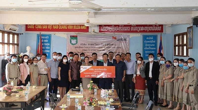 Scholarships and IT Equipment Provided to Vietnamese Lao students