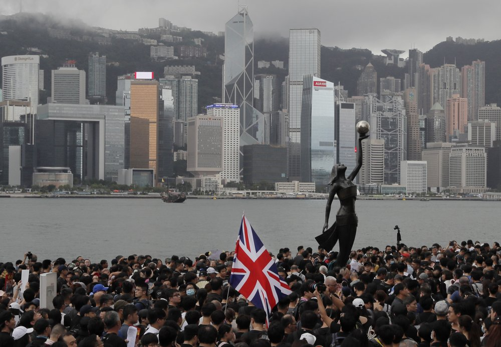 Hong Kong migrants flee to UK to start a new life, fearing China breakdown