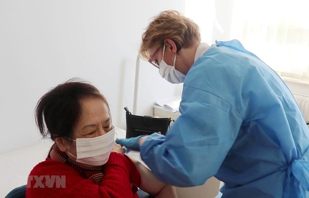 vietnam begins covid 19 vaccinations at vietnam poland medical centre
