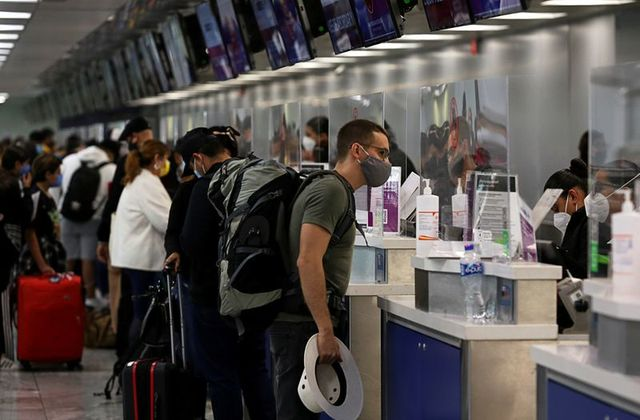 Passengers check-in at airline counters at the Miguel Hidalgo y Costilla International Airport in Guadalajara, Mexico December 9, 2020. REUTERS/Fernando Carranza/File Photo