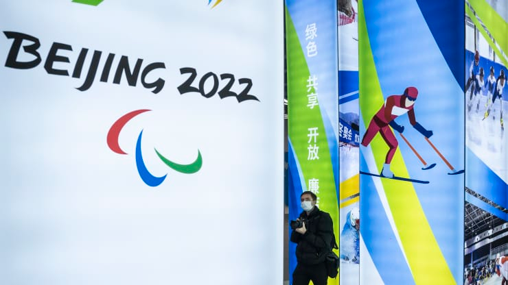 A journalist looks at a display at the exhibition center for the Beijing 2022 Winter Olympics in Yaqing district on February 5, 2021 in Beijing, China. Kevin Frayer | Getty Images