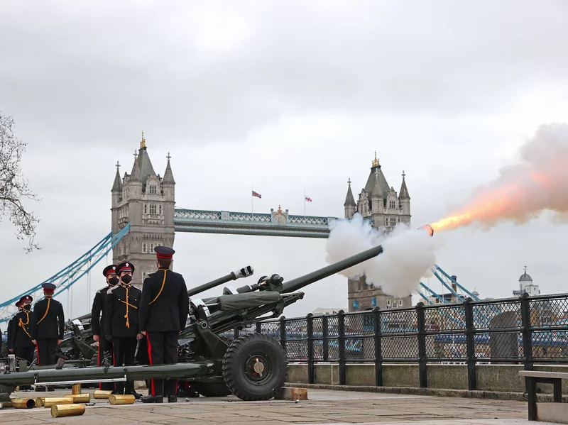 The Honourable Artillery Company fire a gun salute at the Tower of London on Saturday to honor Prince Philip, the Duke of Edinburgh, who died on Friday at age 99. Chris Jackson/Getty Images