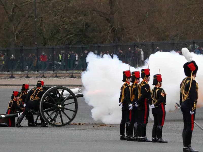 Members of the King's Troop Royal Horse Artillery fire a gun salute at Woolwich Barracks on Saturday. The guns used here were also used to mark the wedding Queen Elizabeth II Prince Philip 73 years ago. Alastair Grant/Getty Images