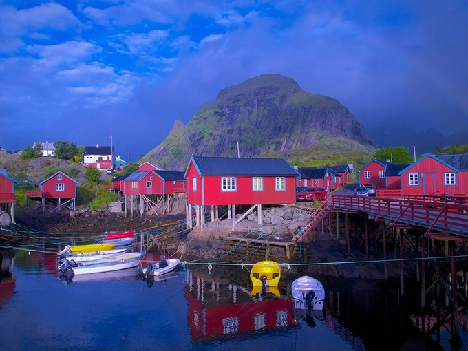 The Lofoten islands of Nordland are among the most scenic places on earth. Vertical spires of glacially carved granite rise from the Norwegian Sea 100 miles north of the Arctic Sea—but the weather is surprisingly mild, due to the Gulf Stream. Photo: 