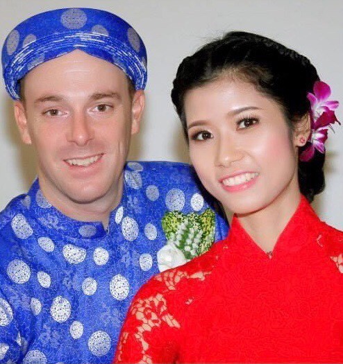 Tram and her husband in Vietnamese traditional clothes.  Photo: In the courtesy of the family