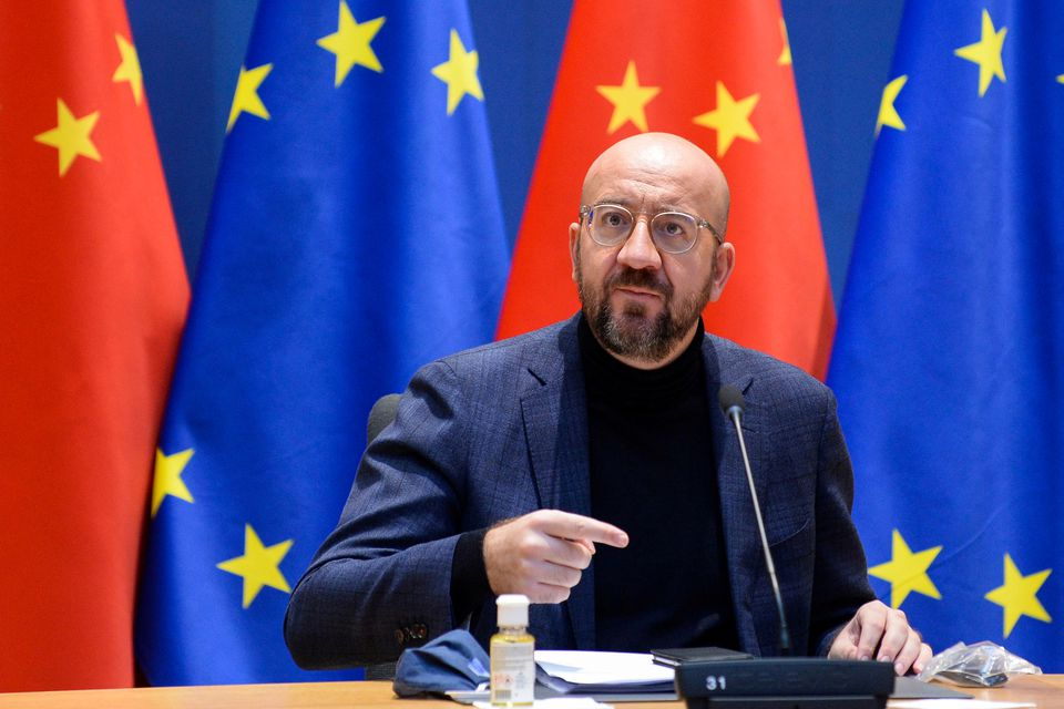 European Council President Charles Michel gestures during a video conference with European Commission President Ursula von der Leyen, German Chancellor Angela Merkel, French President Emmanuel Macron and Chinese President Xi Jinping, in Brussels, Belgium December 30, 2020. REUTERS/Johanna Geron/Pool/File Photo