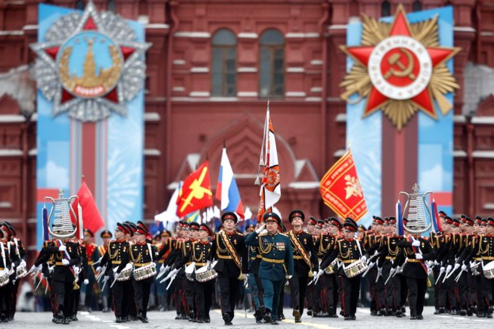 Russian service members and cadets march during a military parade on Victory Day, which marks the 76th anniversary of the victory over Nazi Germany in World War Two, in Red Square in central Moscow, Russia May 9, 2021. REUTERS/Maxim ShemetovREUTERS